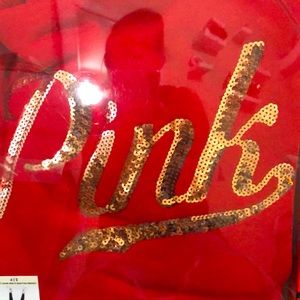 Red sweatshirt n a pair of leggings never worn